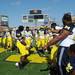 Michigan defensive end Frank Clark dances with his teammates before the Outback Bowl at Raymond James Stadium in Tampa, Fla. on Tuesday, Jan. 1. Melanie Maxwell I AnnArbor.com